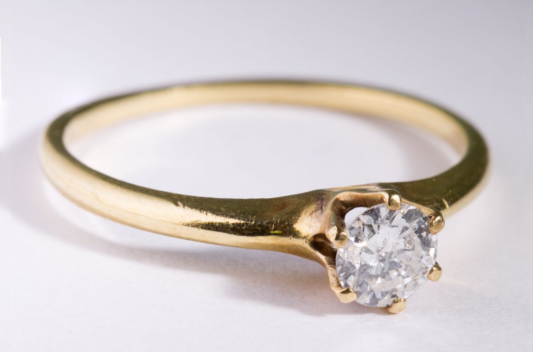 14k Gold and Diamond Ring: 14k Gold and Diamond Ring Having a solitaire set round cut diamond weighing approximately 0.33CT Size: 6.5 Weight: 0.96 dwts. (total weight) Category: Jewelry & Timepieces > 14k Gold Tax Status: Subje