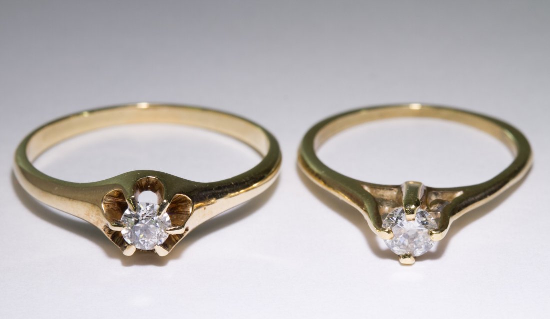 14k Gold and Diamond Rings: 14k Gold and Diamond Rings Two rings, both having solitaire set round cut diamonds weighing approximately 0.20CT and 0.25CT Size: 5 & 8.5 Weight: 2.49 dwts. (total weight) Category: Jewelry & Timepiec