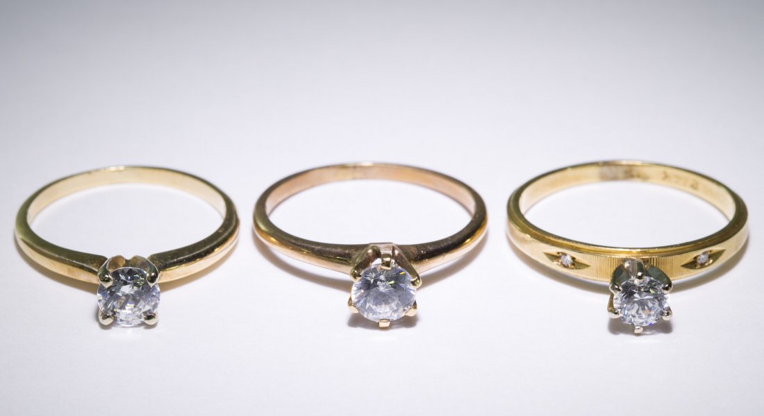 14k Gold and Clear Crystal Rings: 14k Gold and Clear Crystal Rings Three rings, all having a solitaire set round cut clear crystal Size: 5, 6.5 & 7 Weight: 3.90 dwts. (total weight) Category: Jewelry & Timepieces > 14k Gold Tax Status