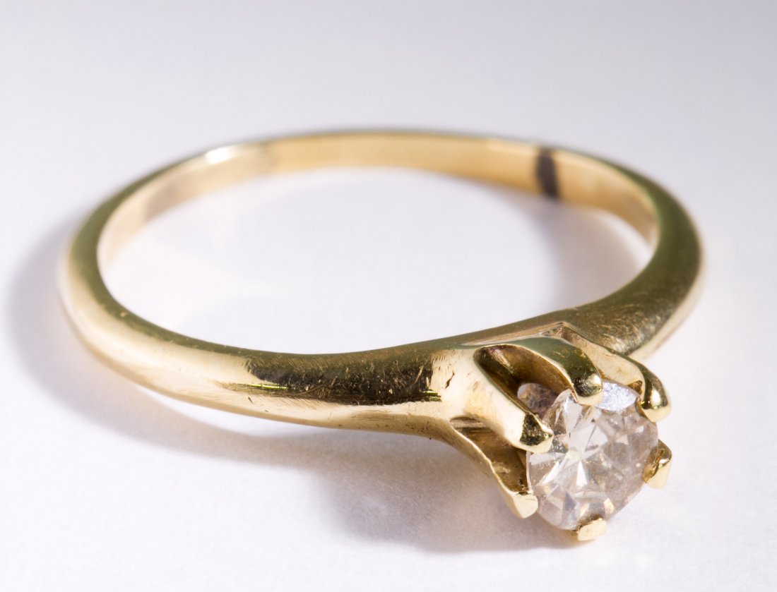 14k Gold and Diamond Ring: 14k Gold and Diamond Ring Having a solitaire set round cut diamond Size: 6.5 Weight: 1.58 dwts. (total weight) Category: Jewelry & Timepieces > 14k Gold Tax Status: Subject to an 8.25% sales tax for I