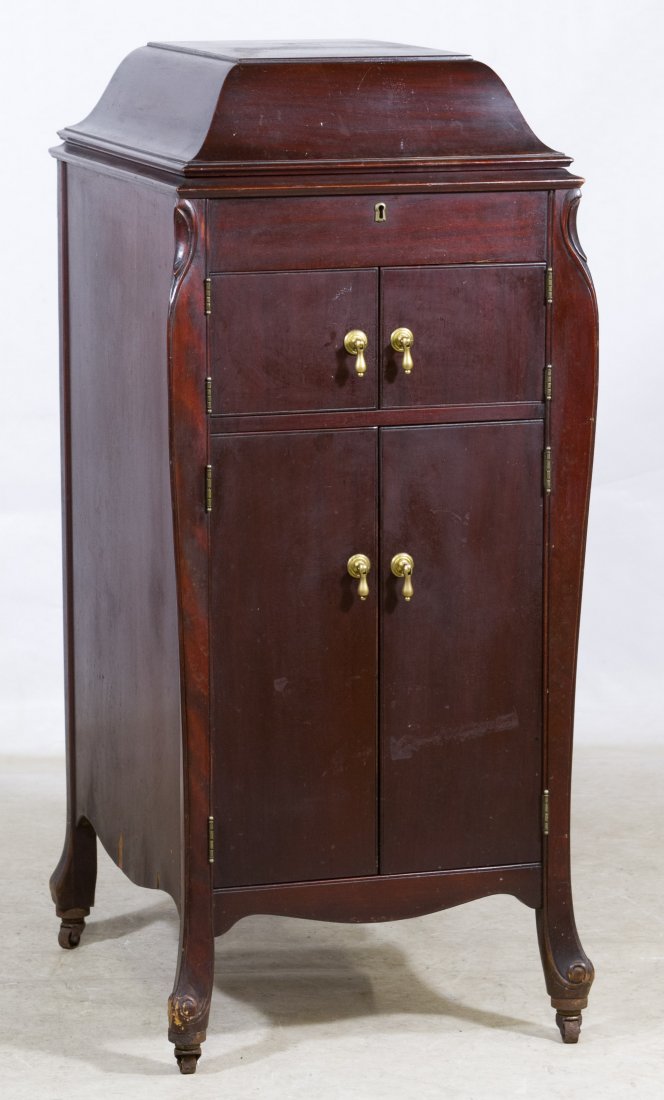 Victrola by Victor Talking Machine: Victrola by Victor Talking Machine Style VV-XI having a lift top over two small doors over two doors; records storage in lower section Height: 43.00 inches, Width: 19.00 inches, Depth: 22.50 inches Ca