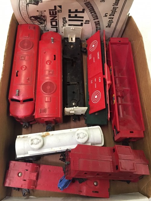 Lionel Model #211 'The Texas Special' Plastic Engine: Lionel Model #211 'The Texas Special' Plastic Engine and Tender Together with six Lionel plastic train cars and Corgi Aerial Rescue Tractor Length: 10.50 inches (engine) Category: Toys and Dolls > Vin