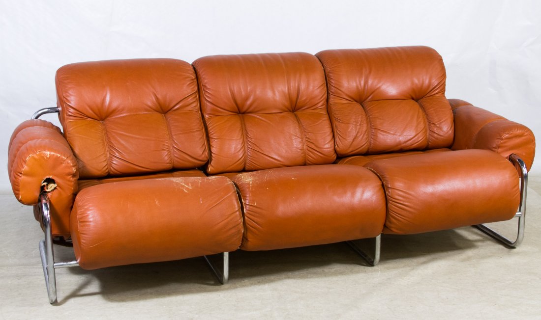 Chrome and Leather Sofa by Mariani: Chrome and Leather Sofa by Mariani Over-stuffed, tufted and stitched leather on chrome base Height: 29.00 inches, Length: 82.00 inches, Width: 38.00 inches Category: Furniture > Contemporary Shipping 