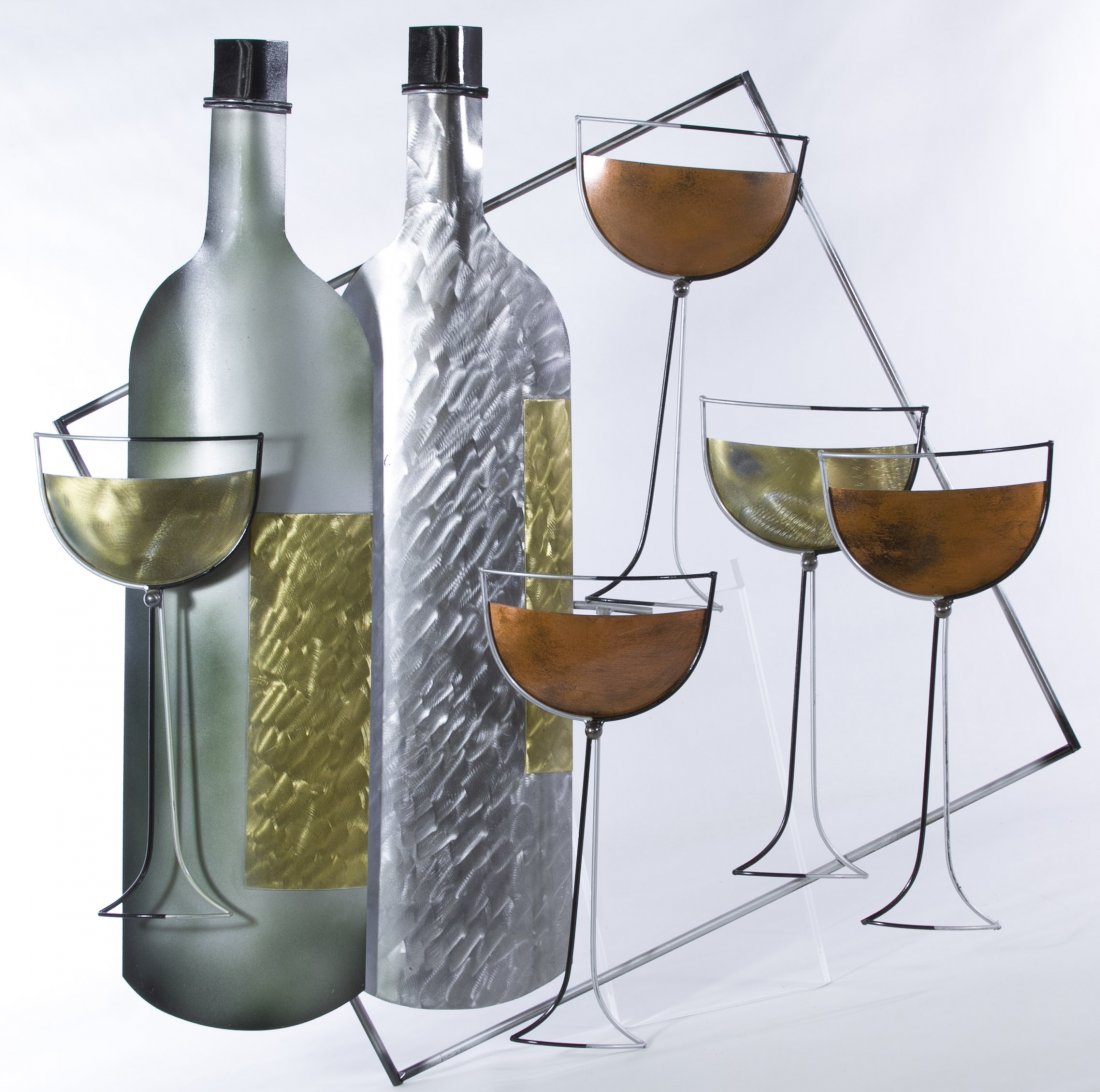Curtis Jere (American, d.2008) Metal Wall Hanging: Curtis Jere (American, d.2008) Metal Wall Hanging 2000, signed bottom center, depicting four wine glasses and two wine bottles Height: 30.00 inches, Width: 31.00 inches Category: Decorative Arts > Obj