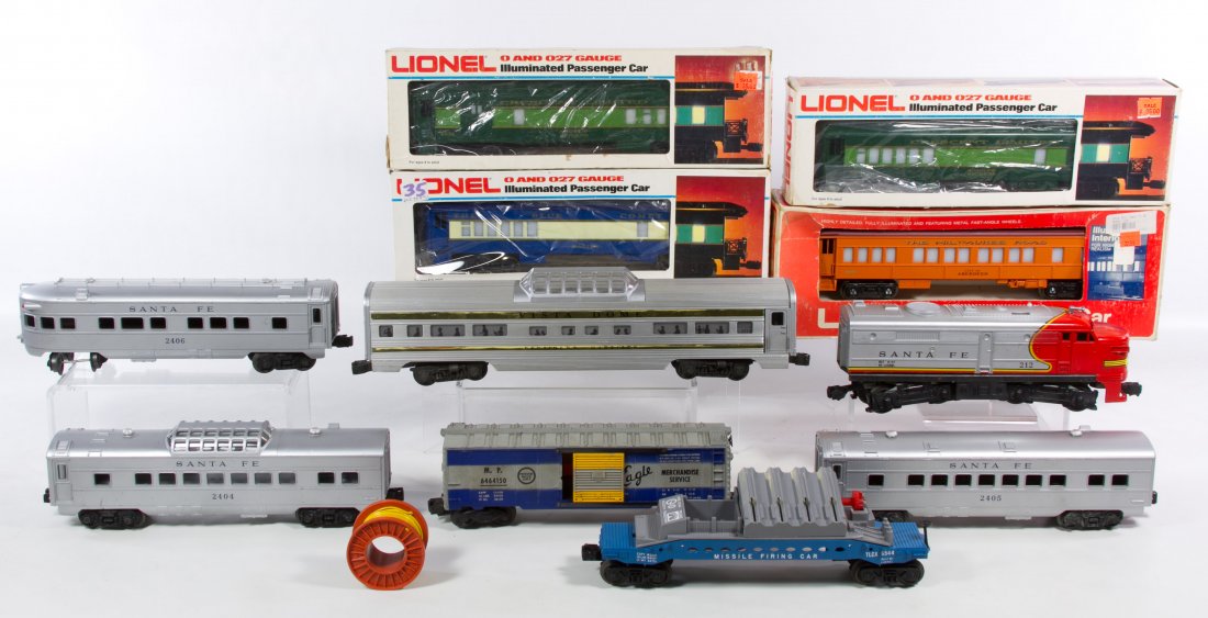 Lionel O-Gauge Train Car Assortment: Lionel O-Gauge Train Car Assortment Eleven train cars including #2522 President Harrison Vista Dome car with original box, #6544 Missile Firing Car with original box, Santa Fe cars #212, 2404, 2405 an
