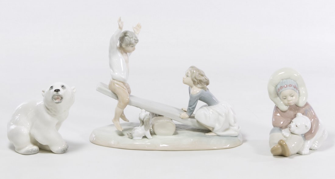 Lladro Figurines: Lladro Figurines Two items including a Lladro #4867 'See-Saw' retired in 1991 and a Lladro #1195 'Eskimo,' retired in 2007; together with a 2003 'Made in USSR' polar bear figurine Height: 8.00 inches,
