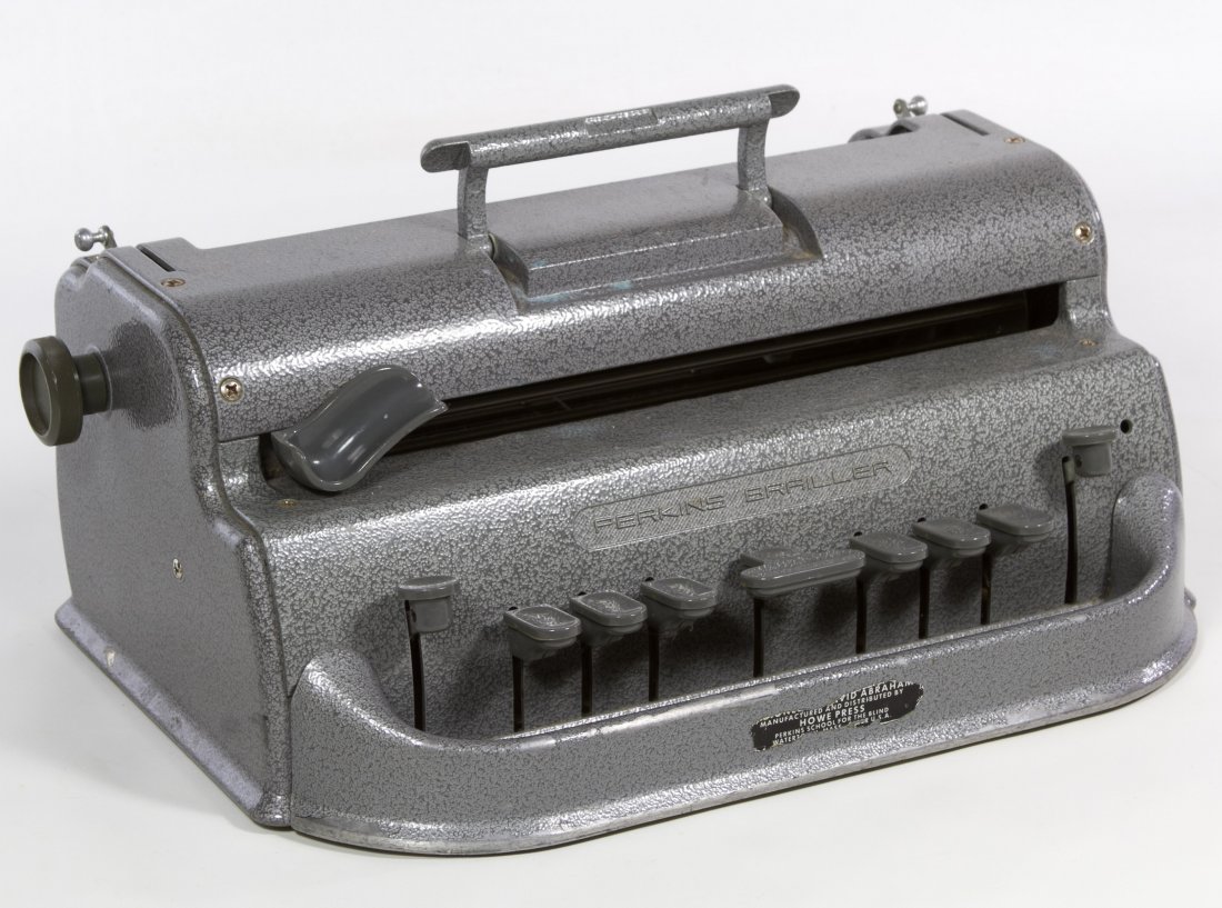 Perkins Brailler Typewriter by Howe Press: Perkins Brailler Typewriter by Howe Press Having a serial or model #J3159 marked on the pressboard underside, a cast metal body and plastic coated finger keys Height: 7.00 inches, Length: 13.75 inches