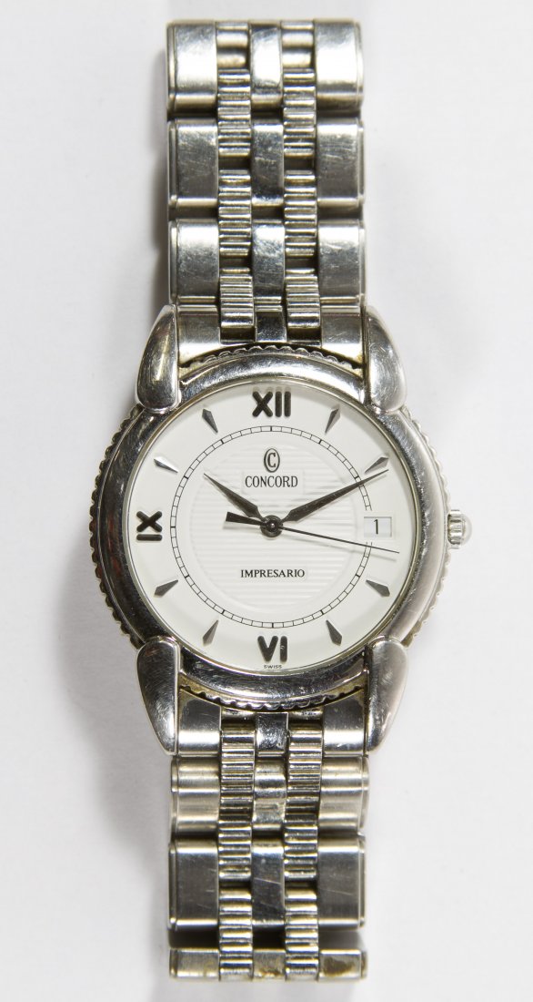 Concord 'Impresario' Wrist Watch: Concord 'Impresario' Wrist Watch Model 14.C2.212 having white dial and date option, original box with paperwork and extra links Length: 7.00 inches (inside adjustable band) Category: Jewelry & Timepie