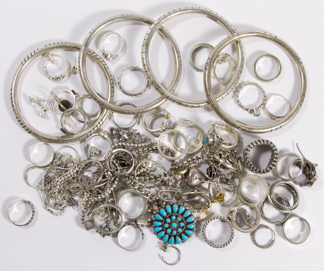 Sterling Silver Jewelry Assortment: Sterling Silver Jewelry Assortment Including forty rings, six necklaces (some with pendants), four bangle and four chain bracelets, nine pairs of earrings, a pin / pendant with turquoise and a single