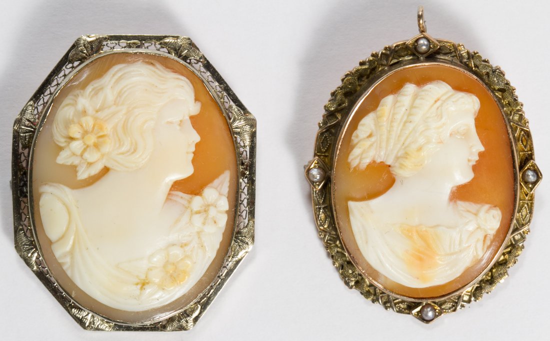 10k White and Yellow Gold Framed Carved Shell Cameo Pin: 10k White and Yellow Gold Framed Carved Shell Cameo Pin / Pendant Two pieces; smaller piece having a swing up pendant loop and frame adorned with seed pearls Length: 1.50 inches, Width: 1.25 inches (l