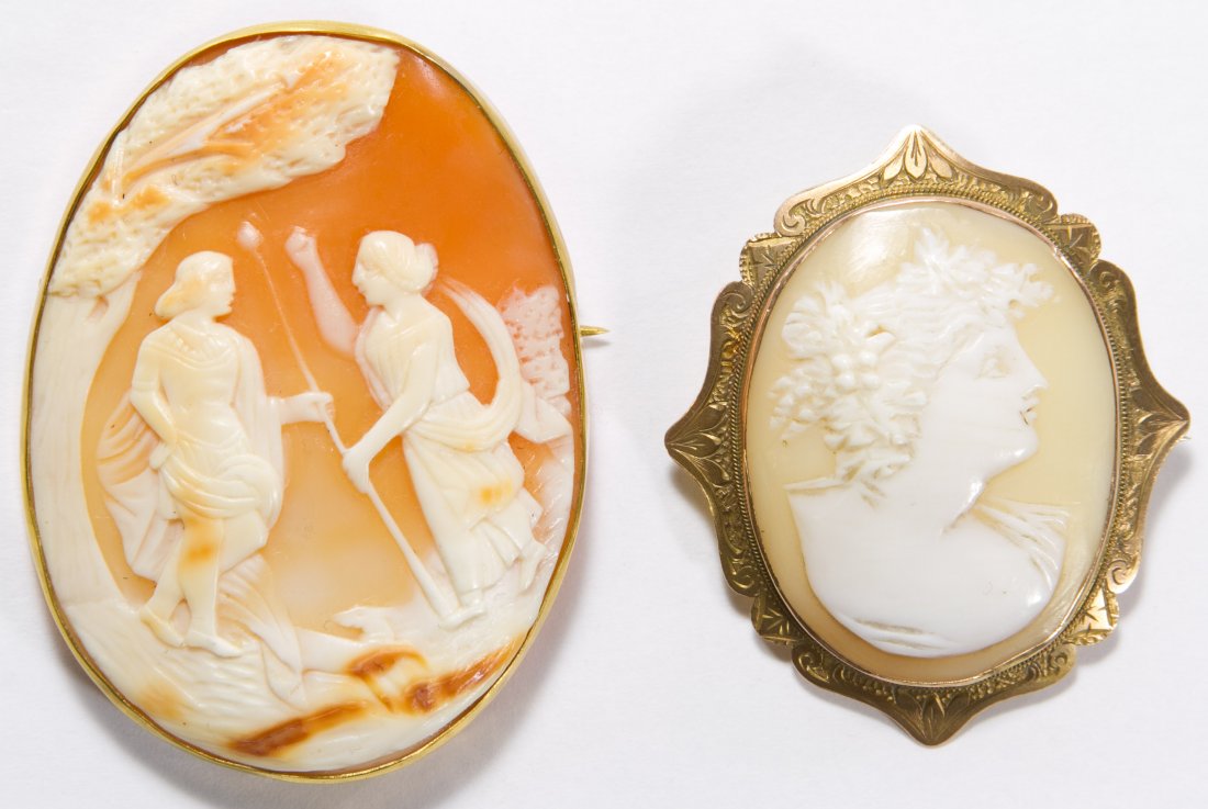 9k Gold Framed Carved Shell Cameo Pins: 9k Gold Framed Carved Shell Cameo Pins Two pieces; largest piece having two people, smaller piece having pendant loop Length: 2.25 inches, Width: 1.75 inches Weight: 16.16 dwts. (total weight) Categor