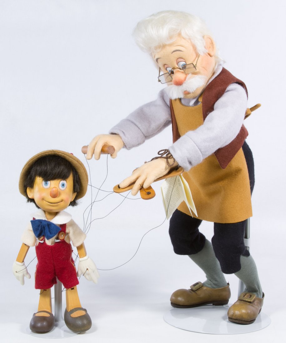 R. John Wright 'Geppetto & Pinocchio' Doll Set: R. John Wright 'Geppetto & Pinocchio' Doll Set 1995, limited edtion certificate #366/500, including a felt Geppetto doll and a wooden Pinocchio doll with original box Height: 17.00 inches (tallest) Ca