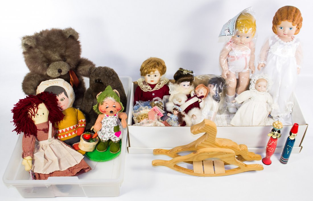 Porcelain and Cloth Doll Assortment: Porcelain and Cloth Doll Assortment Three boxes including ten porcelain baby and girl dolls, two plush bears, an Annalee bear, a wooden rocking horse; together with doll blankets, crocheted doilies an