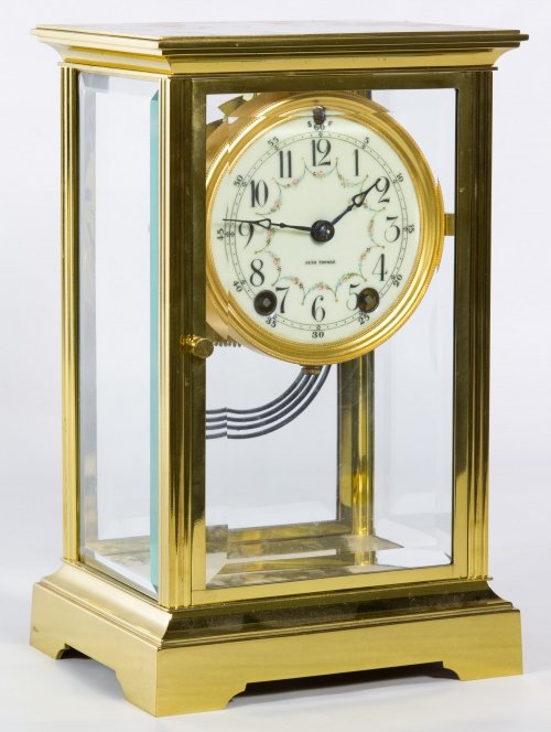 Seth Thomas Regulator Mantel Clock: Seth Thomas Regulator Mantel Clock Having an enamel face, four beveled glass panels, two keys, two pendulums and parts Height: 10.75 inches, Width: 6.75 inches, Depth: 5.25 inches (case) Category: Dec