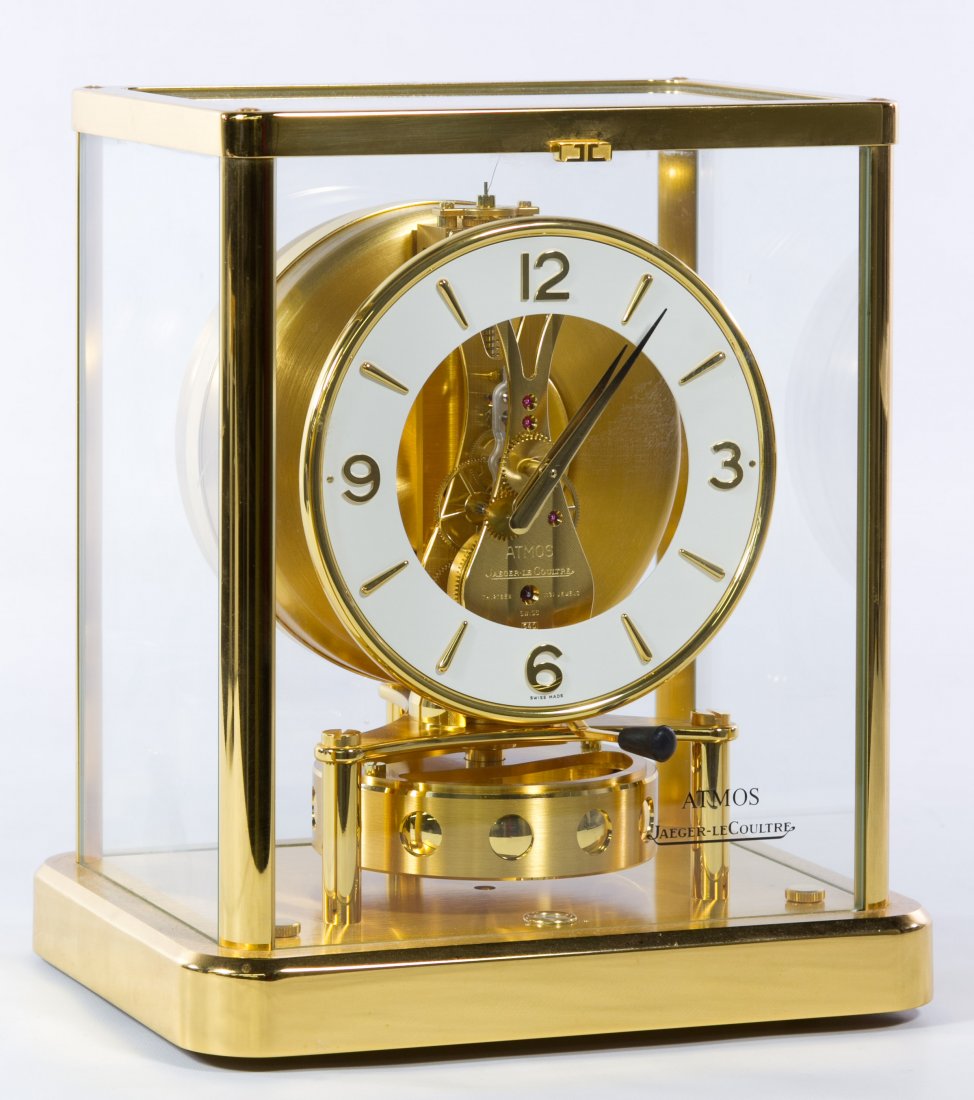 Jaeger Le Coultre 'Atmos' Perpetual Mantle Clock: Jaeger Le Coultre 'Atmos' Perpetual Mantle Clock Brass and glass clock, serial #667440, model #540, thirteen jewel movement Height: 9.00 inches, Width: 7.75 inches, Depth: 6.00 inches Category: Decora