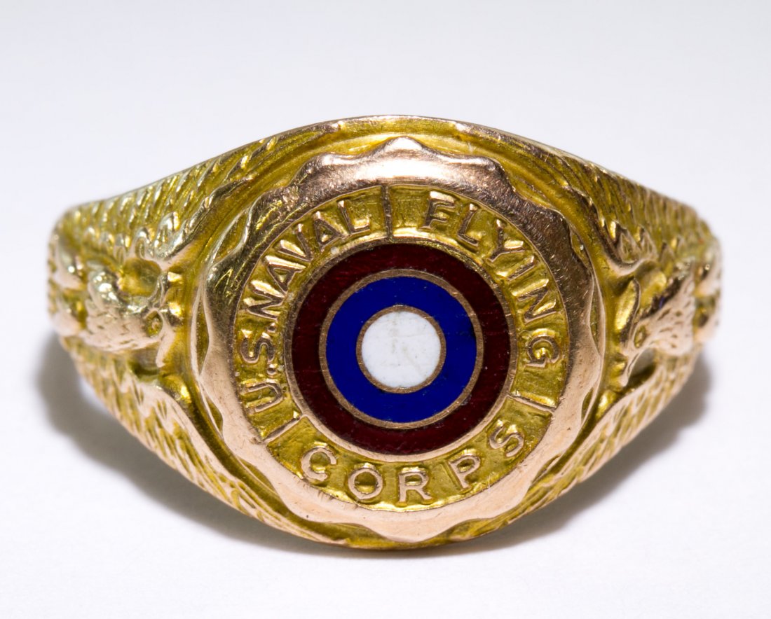 10k Gold World War I US Naval Flying Corps Ring: 10k Gold World War I US Naval Flying Corps Ring Having enamel bull's eye design in center; marked 10k on inside front Size: 7.5 Weight: 4.17 dwts. (total weight) Category: Jewelry & Timepieces > 10k G