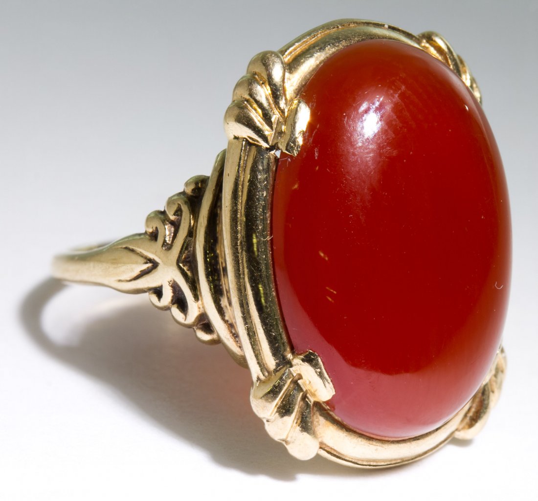 10k Gold and Carnelian Ring: 10k Gold and Carnelian Ring Having an oval cut carnelian, stamped marks to the interior Size: 4.25 Weight: 2.31 dwts. Category: Jewelry & Timepieces > 10k Gold Shipping Status: Leonard Auction, Inc. w