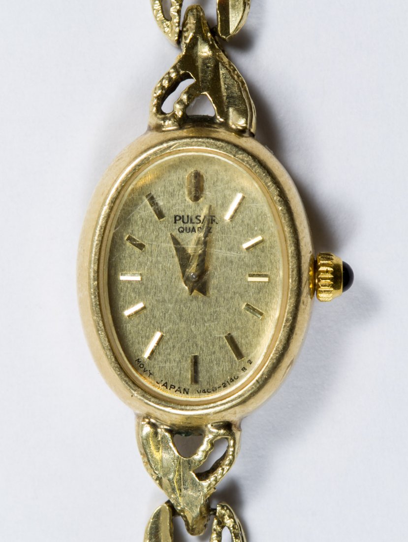 Pulsar 14k Gold Case and Band Wrist Watch: Pulsar 14k Gold Case and Band Wrist Watch Stamped 14k mark on back of watch and band Length: 7.25 inches Weight: 7.79 dwts. (total weight) Category: Jewelry & Timepieces > Watches Shipping Status: Leo