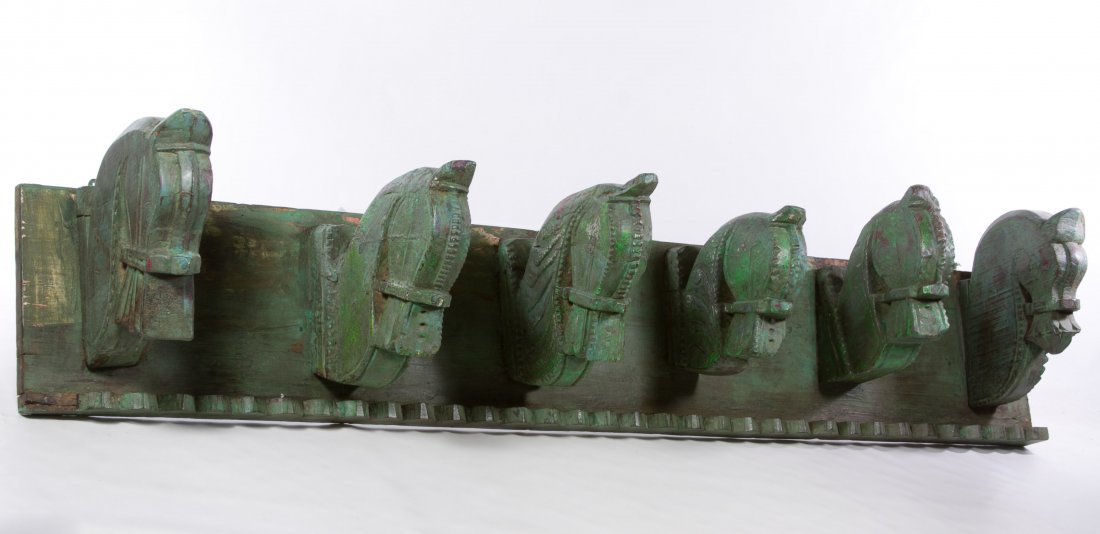 Carved Wood Horse Coat Rack: Carved Wood Horse Coat Rack Having six carved wood horse heads attached to a back board decorated with scalloped trim; entire piece painted Height: 8.25 inches, Length: 50.50 inches, Depth: 10.00 inch