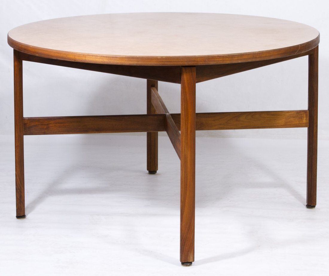 Mid-Century Modern Walnut Table by Jens Risom: Mid-Century Modern Walnut Table by Jens Risom Round table on four legs with crossed stretchers Height: 29.00 inches, Diameter: 48.00 inches Category: Furniture > Mid-Century Modern Shipping Status: Du