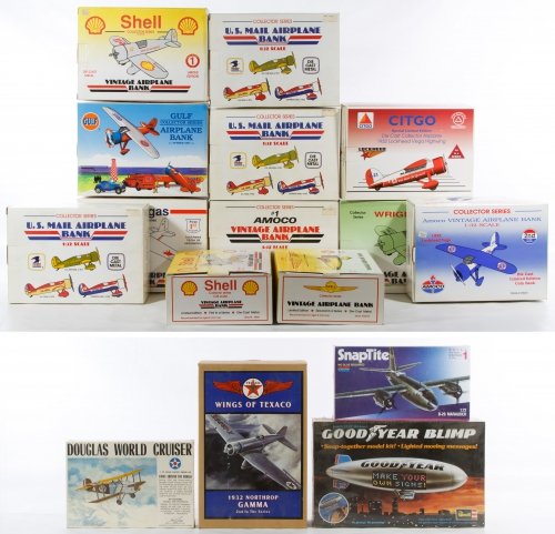 Die Cast Airline Bank and Model Kit Assortment: Die Cast Airline Bank and Model Kit Assortment Including thirteen unopened boxes of die cast airplane banks and three sealed model kits Category: Toys and Dolls > Modern Toys Shipping Status: Leonard 