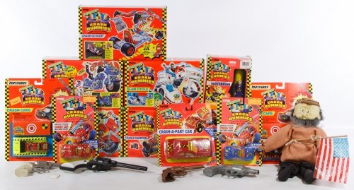 Tyco Crash Dummies Vehicle Assortment: Tyco Crash Dummies Vehicle Assortment Eleven items including Crash Go Kart, Slam Cycle, Crash Chopper, Crash 'N Dash, Crash Cycle and five cars in bubble packs; together with vintage toy pistols and a