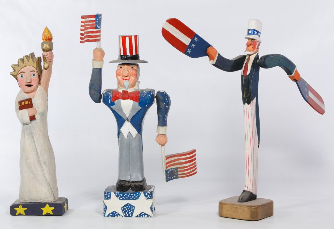 Carved and Painted Wood Patriotic Sculptures: Carved and Painted Wood Patriotic Sculptures Three items including a 1989 Uncle Sam whirligig by James Dunsmore, a 1987 Uncle Sam whirligig by G. Beveawk and a Statue of Liberty by K.N. Ferris Height: