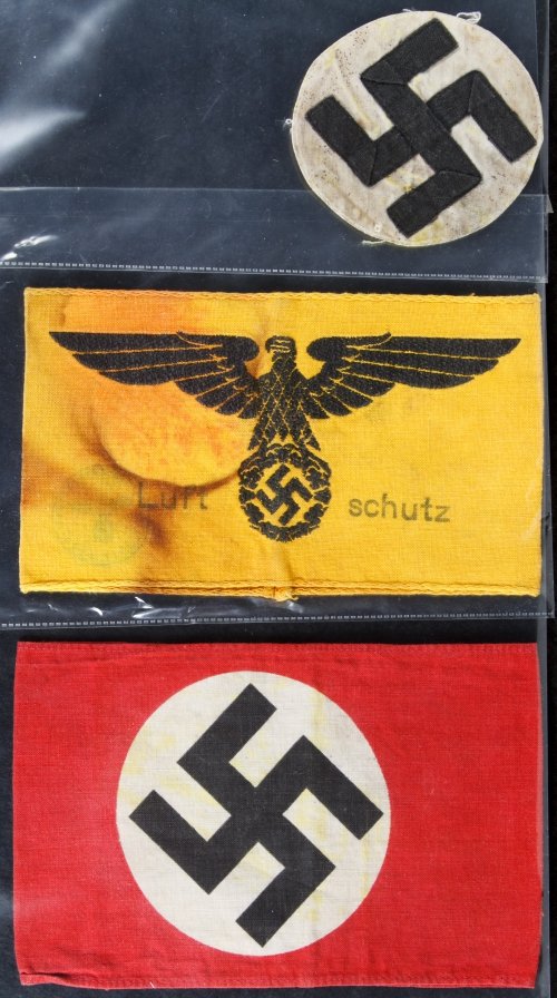 World War II German Arm Bands and Propaganda Cards: World War II German Arm Bands and Propaganda Cards Including two arm bands, a patch and seven paper German propaganda cards Length: 7.00 inches (red arm band) Category: Military & Weapons > World War 