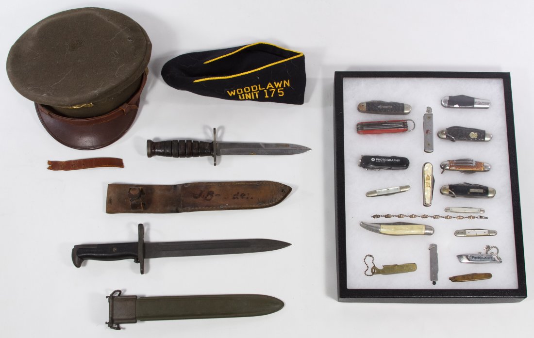 World War II Visor Cap, M1 Garand Bayonet and US: World War II Visor Cap, M1 Garand Bayonet and US Carbine Bayonet and Sheath Together with an American Legion cap, sterling silver commemorative military bracelet and seventeen pocket knives with displ