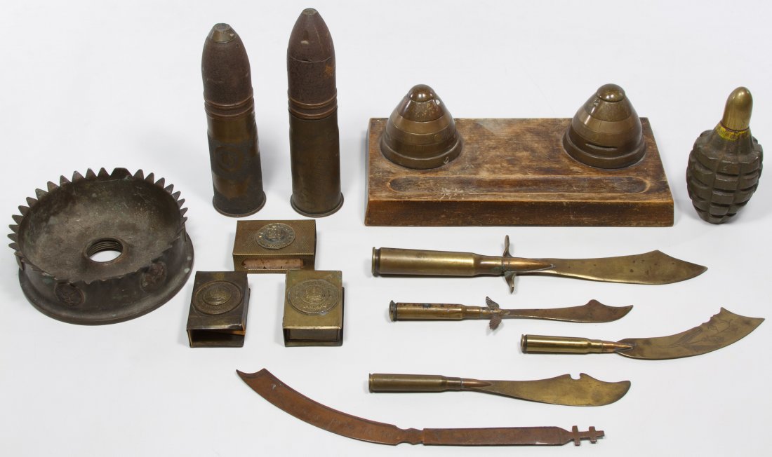 World War I / II Trench Art Assortment: World War I / II Trench Art Assortment Thirteen items including match holders, knives, ink wells and World War II hand grenade lighter Width: 9.50 inches (widest) Category: Military & Weapons > Modern