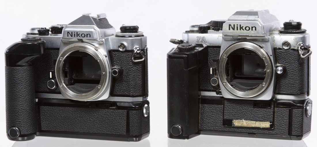 Nikon 35mm Cameras: Nikon 35mm Cameras Two cameras including Nikon FA with serial #5226946 and Nikon FE with serial #3844829; both have attached motor drives Width: 6.00 inches (widest) Category: Cameras & Electronics > 