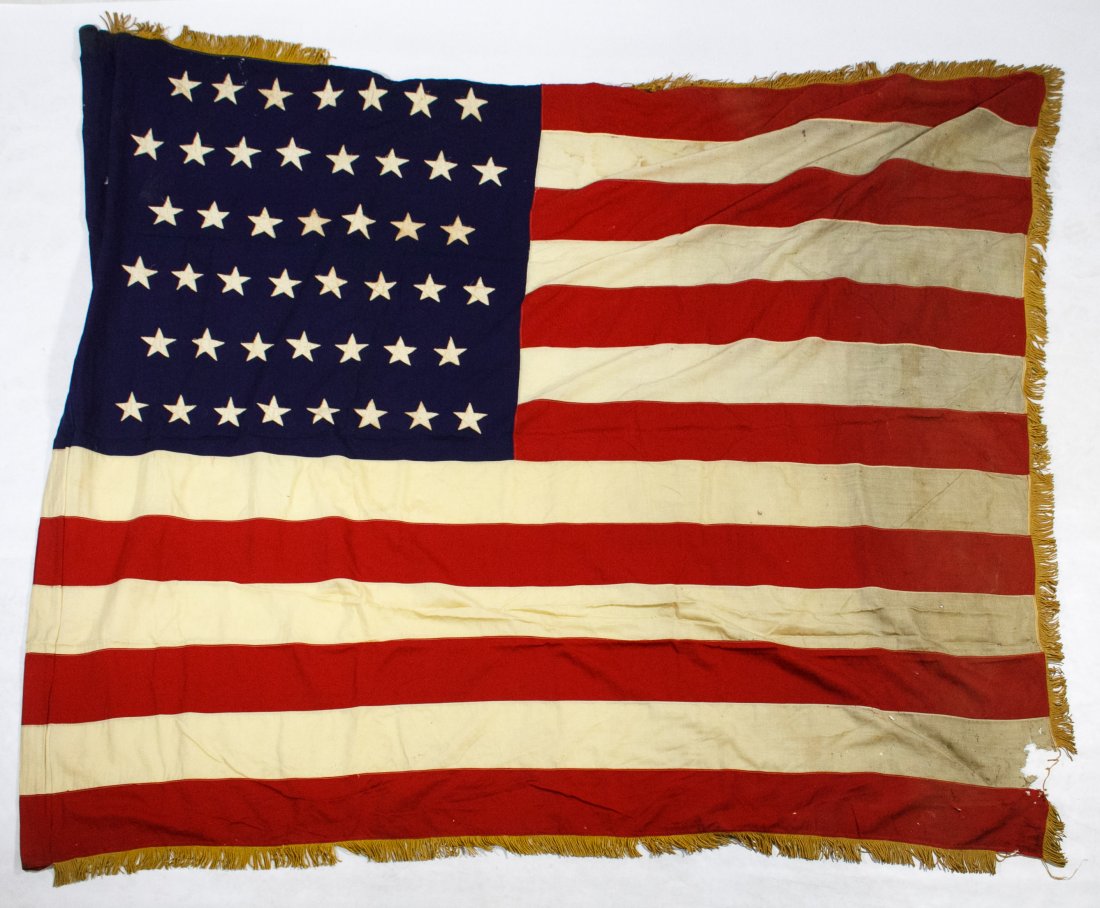 45-Star American Flag Assortment: 45-Star American Flag Assortment Five c.1896 items including four flags on wooden poles and one flag with a fringed end Height: 68.00 inches, Width: 78.00 inches (largest) Category: Collectibles > Pol