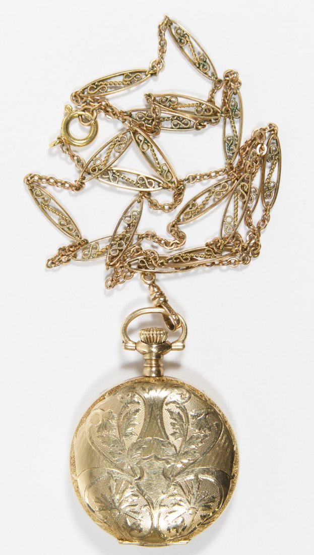 Waltham 'Betsy Ross' Gold Filled Hunter Case Pocket: Waltham 'Betsy Ross' Gold Filled Hunter Case Pocket Watch Serial #871654 dating to 1875, stem wind and set in a fully engraved case; together with an H&H gold filled watch chain Diameter: 1.38 inches