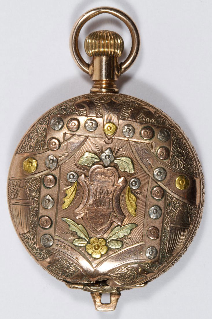 Elgin Gold Filled Hunter Case Pocket Watch: Elgin Gold Filled Hunter Case Pocket Watch Tri-color gold filled and engraved case holding serial #4718822 dating to 1893 having 11 jewels, grade 113, model 1, class 60, pendant wind and set; together