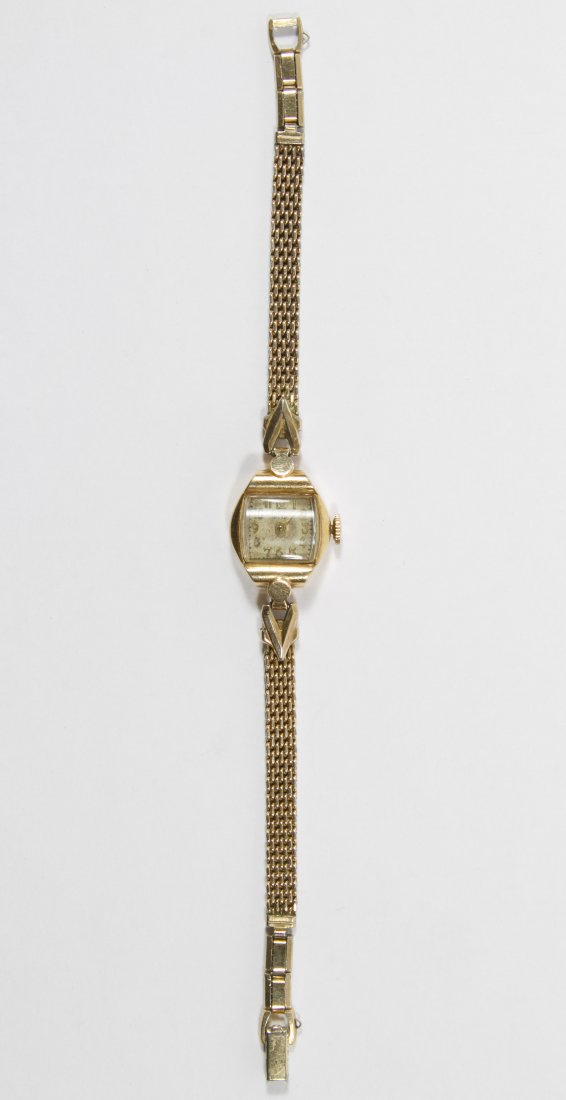 Croton 14k Gold Case Wrist Watch: Croton 14k Gold Case Wrist Watch Stamped 14k gold mark to the inside of the watch Length: 7.00 inches (band) Weight: 8.17 dwts. (total weight) Category: Jewelry & Timepieces > Watches Shipping Status: