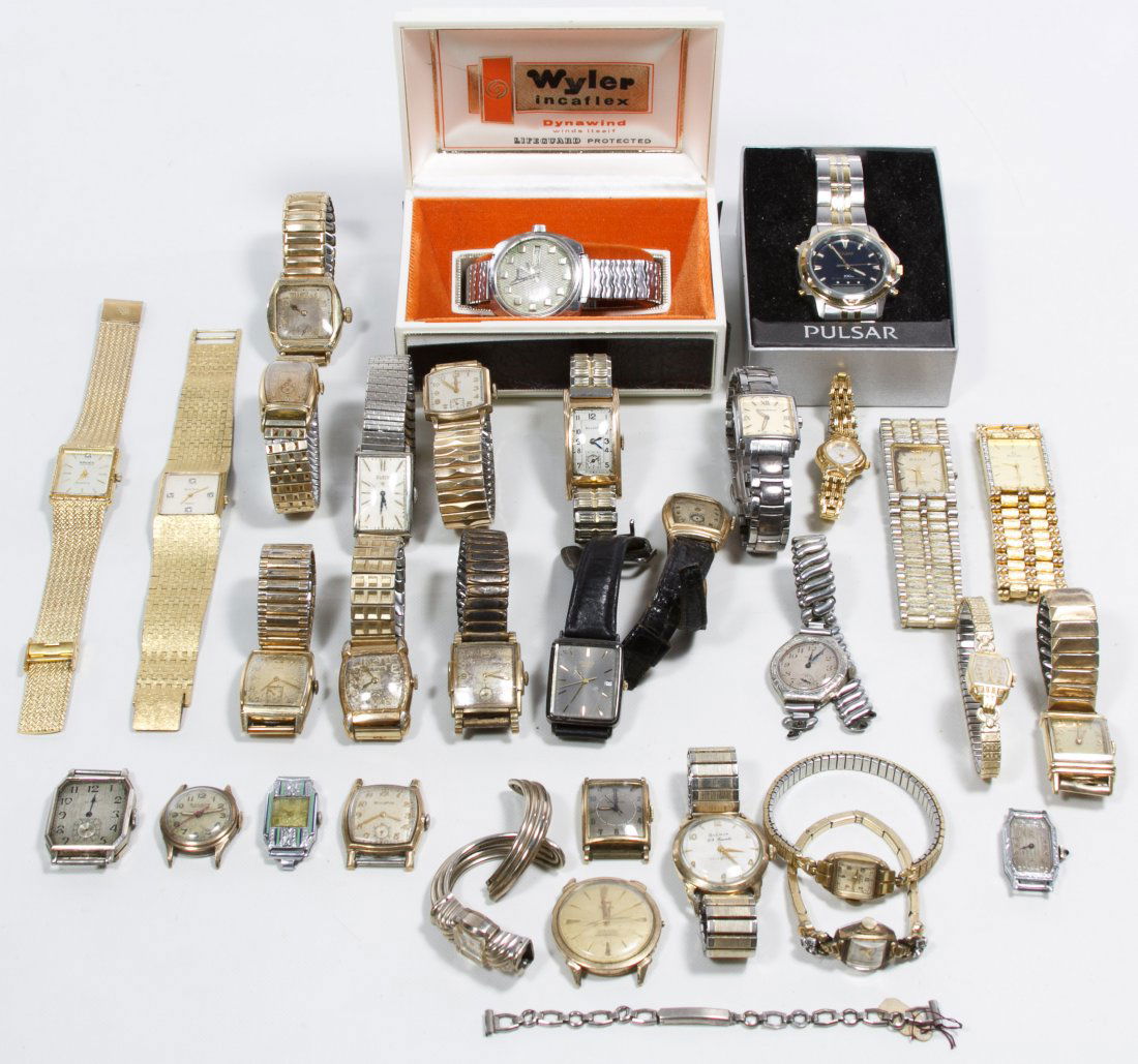 Wrist Watch Assortment: Wrist Watch Assortment Over thirty watches including Elgin, Gruen, Bulova and Pulsar; some 14k and 10k gold filled / rolled Category: Jewelry & Timepieces > Watches Shipping Status: Leonard Auction, I