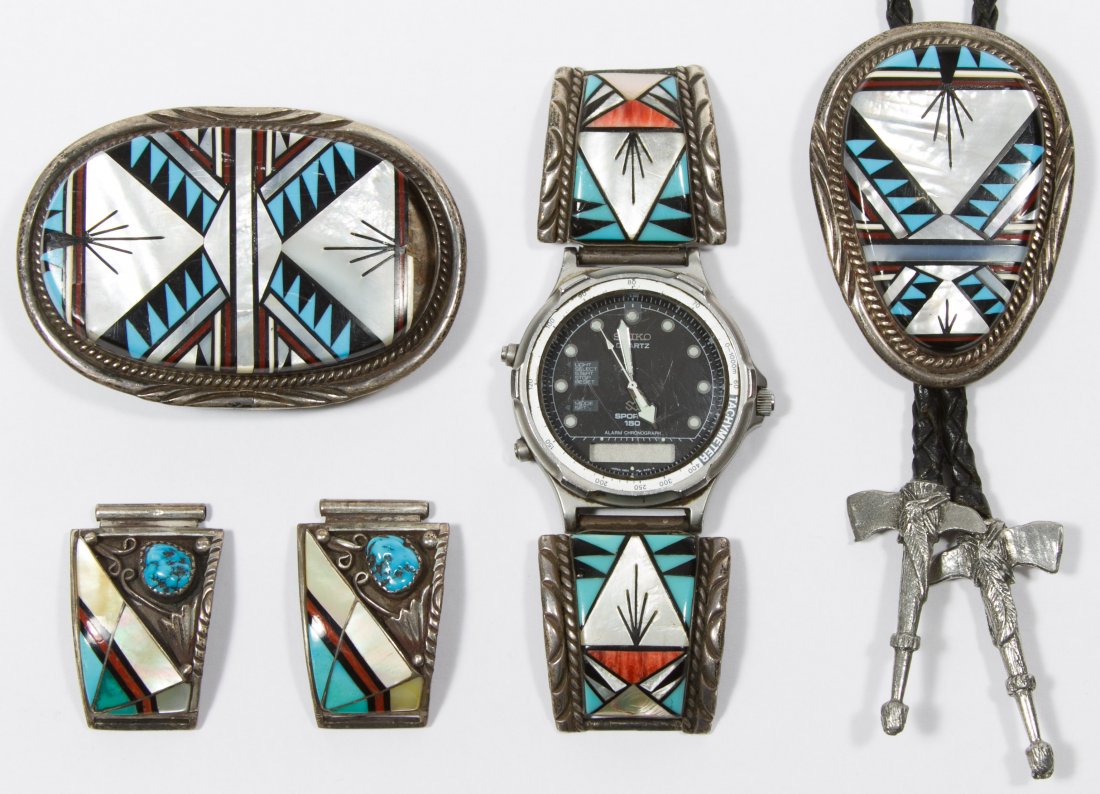 Navajo Sterling Silver Watch, Bolo Tie and Belt Buckle: Navajo Sterling Silver Watch, Bolo Tie and Belt Buckle Assortment Including a Seiko Sport 150 watch with two 'T&J Sterling' marked side panels, two watch band sections with turquoise stone insets, a '