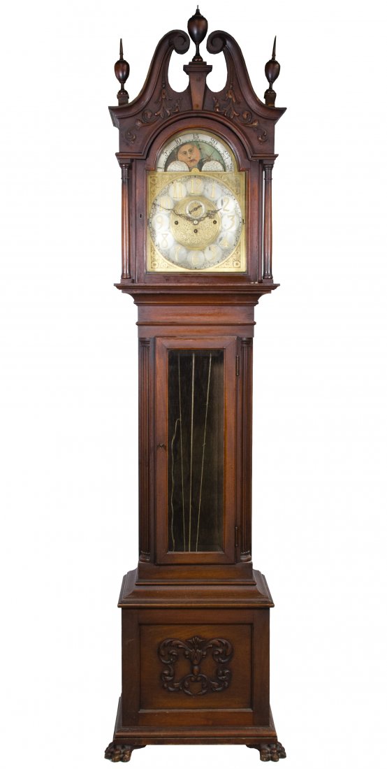 Chippendale Style Mahogany Grandfather Clock by Elite: Chippendale Style Mahogany Grandfather Clock by Elite Having a sun and moon face painted dial, a brass and silver face, numbered en verso of brass plate 79279 and marked Elite; with key, pendulum and
