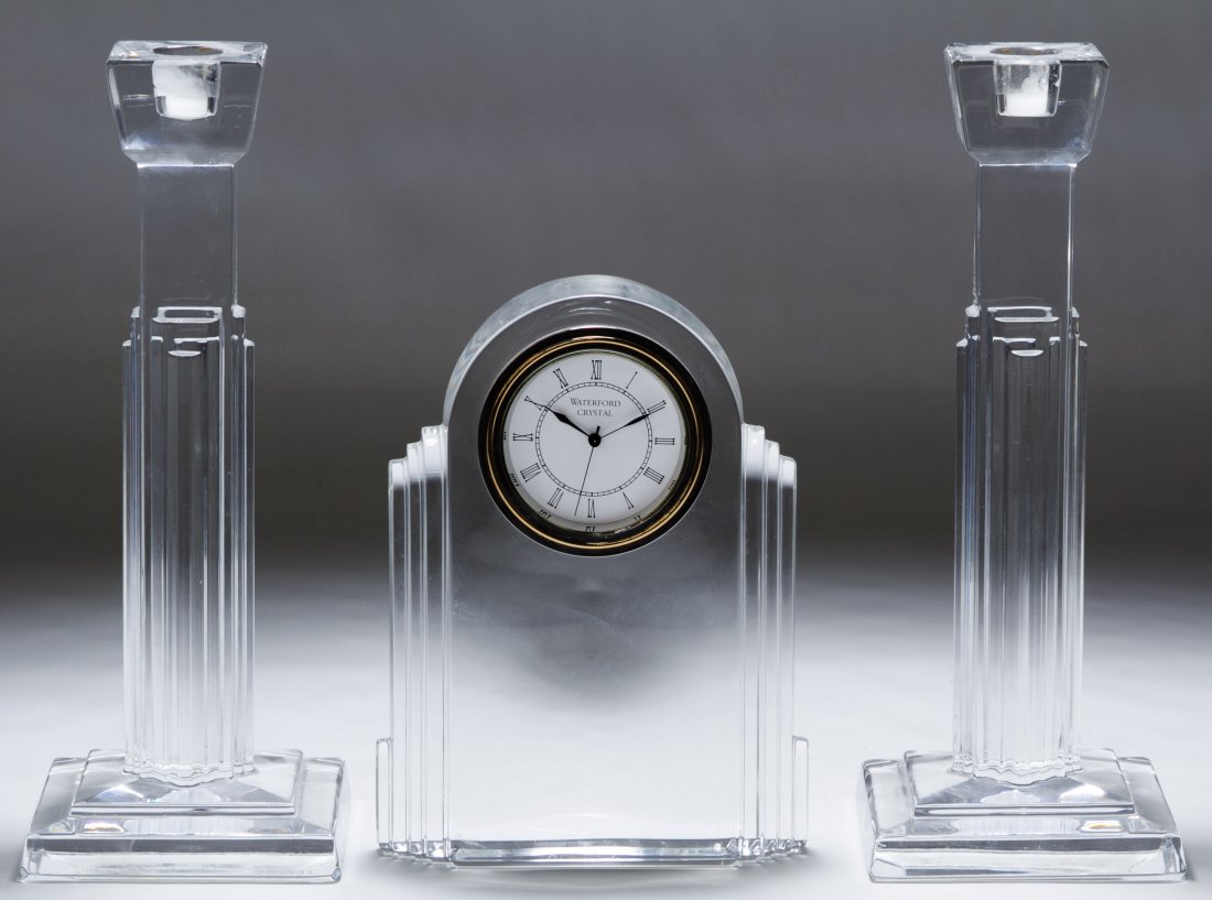 Waterford Crystal Clock and Candleholders: Waterford Crystal Clock and Candleholders Irish, each have stamped mark to the undersides Height: 10.00 inches (candleholder) Category: Crystal > Waterford Shipping Status: Leonard Auction, Inc. will 