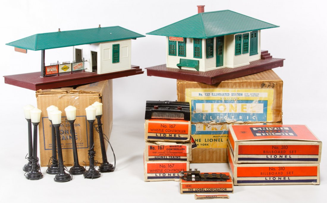Lionel Model Toy Train Building and Bill Board: Lionel Model Toy Train Building and Bill Board Assortment Including freight station #256, illuminated station #132, (2) billboard sets #310, (3) whistle controllers #167, part #153c and (7) street lam