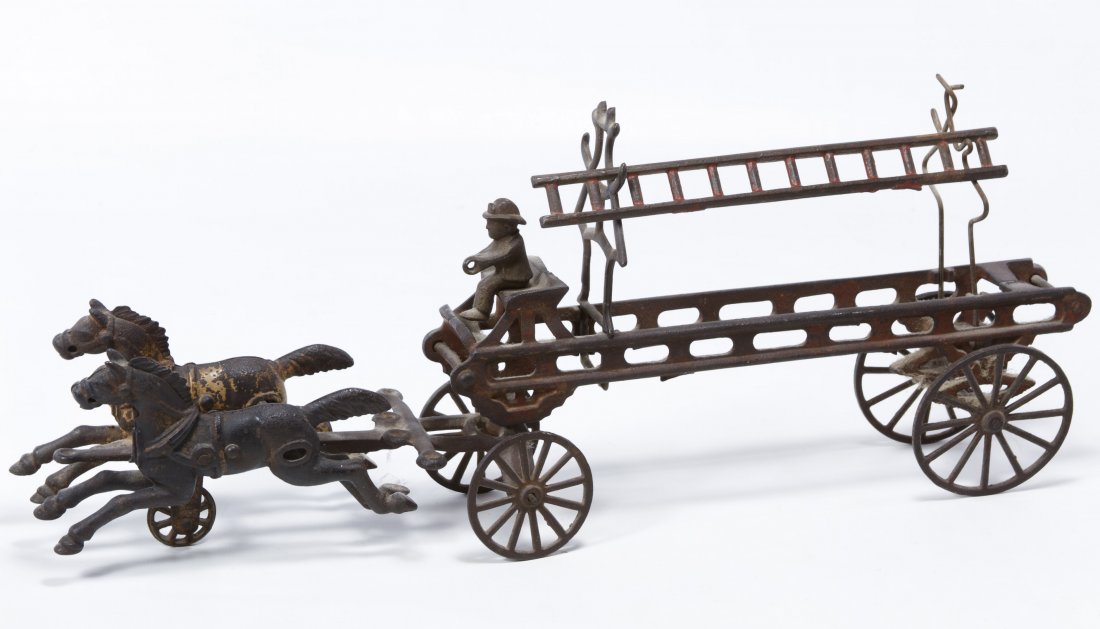 Cast Iron Ladder Fire Wagon: Cast Iron Ladder Fire Wagon Having two horses, a driver, a ladder and a ladder wagon Length: 11.50 inches (wagon alone) Category: Toys and Dolls > Vintage Toys Shipping Status: Leonard Auction, Inc. w