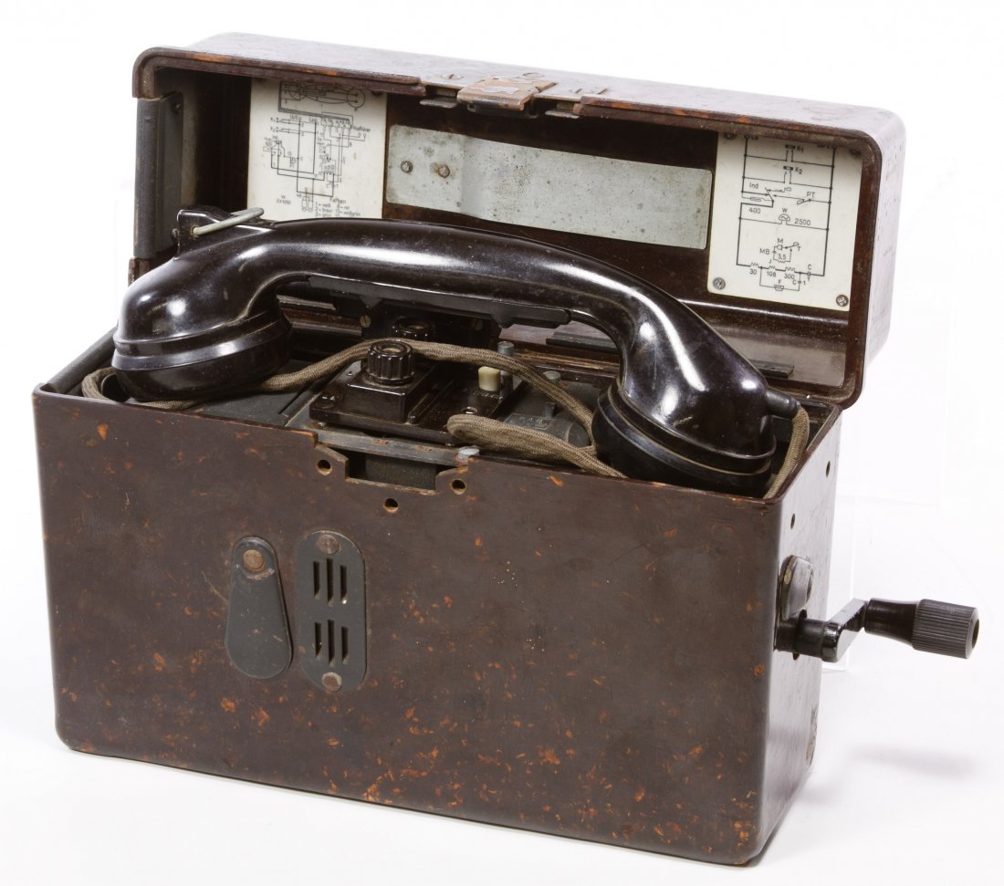 German World War II Field Telephone: German World War II Field Telephone Crank field phone in bakelite case Height: 8.50 inches, Width: 11.00 inches, Depth: 4.00 inches Category: Military & Weapons > World War II Shipping Status: Due to 