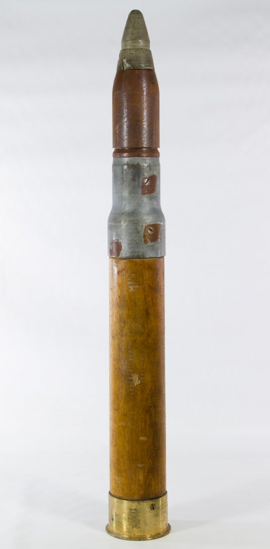 World War II Era Dummy Artillery Shell: World War II Era Dummy Artillery Shell 50 cal, marked on the underside Length: 33.50 inches Category: Military & Weapons > World War II Shipping Status: Due to size, weight, value or shipping complexi