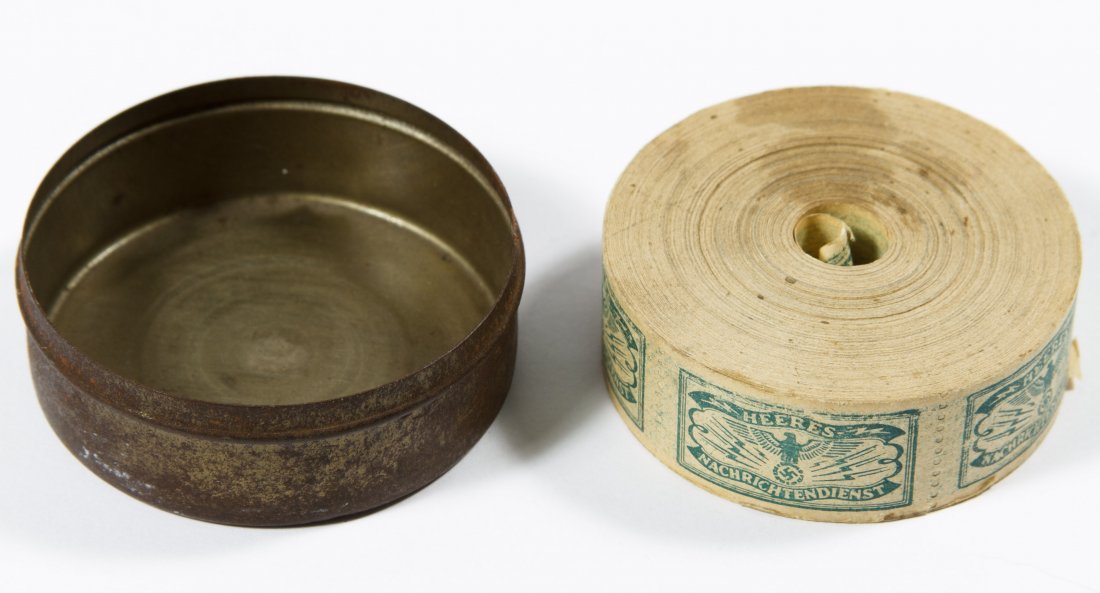 World War II German 'Heeres Nachrichtendienst': World War II German 'Heeres Nachrichtendienst' (Military Intelligence) Sticker Roll Rolled stickers; together with half of a tin case Width: 2.25 inches (case) Category: Military & Weapons > World War