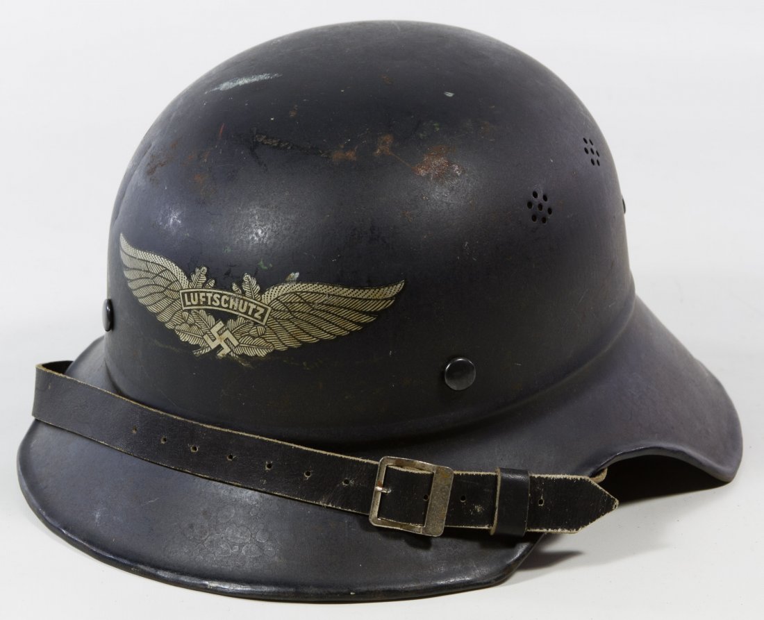 World War II German Civil Defense Gladiator Helmet: World War II German Civil Defense Gladiator Helmet Third Reich Luftschutz; signed by owner inside helmet Length: 12.00 inches, Width: 10.25 inches Category: Military & Weapons > World War II Tax Statu