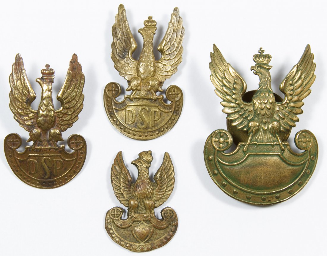 World War II Era Polish Hat Badge Assortment: World War II Era Polish Hat Badge Assortment Four badges including two labeled 'DSP' Height: 2.25 inches, Width: 1.75 inches (widest) Category: Military & Weapons > World War II Shipping Status: Leona