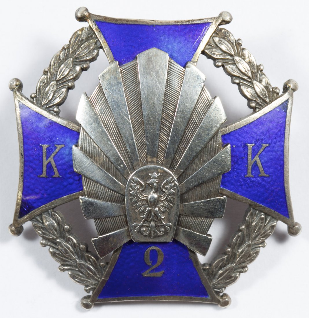 World War II Era Polish Medal: World War II Era Polish Medal Having a blue enamel cross labeled 'KK2' Height: 1.50 inches, Width: 1.50 inches Category: Military & Weapons > World War II Shipping Status: Leonard Auction, Inc. will d