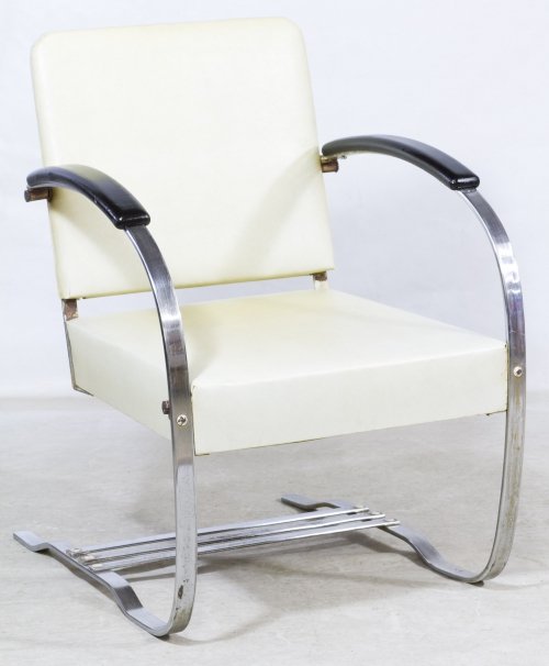 Art Deco Springer Chair designed by Wolfgang Hoffman: Art Deco Springer Chair designed by Wolfgang Hoffman for Howell Furniture c.1930, having a white vinyl seat with black wood arms; pictured in a Century of Progress booklet Height: 32.50 inches, Width: