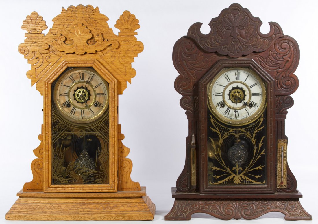 Victorian Mantel Clocks by Waterbury: Victorian Mantel Clocks by Waterbury Two shelf clocks with reverse painted glass doors including a walnut clock with an attached barometer and thermometer and an oak clock Height: 22.00 inches, Width: