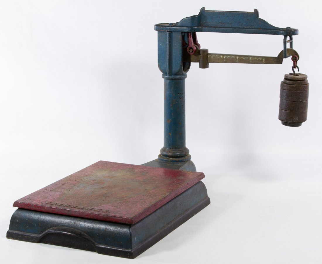 Fairbanks Cast Iron Scale: Fairbanks Cast Iron Scale Having a green body and red top; including weights Height: 16.75 inches, Width: 16.00 inches, Depth: 22.00 inches Category: Primitives > Kitchen Tax Status: Subject to an 8.2